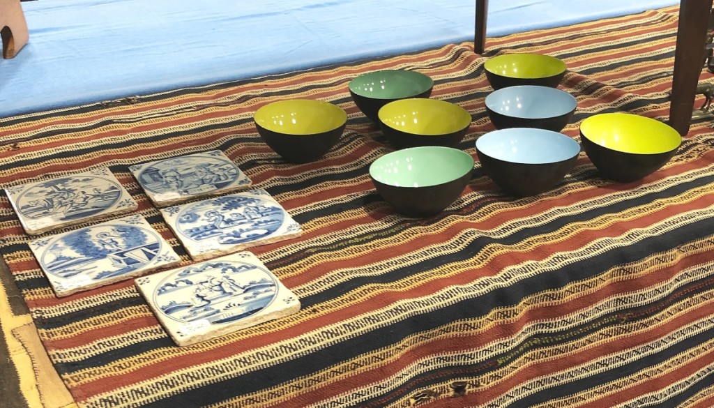 It was an interesting juxtaposition. John Hunt Marshall, Florence, Mass., deals both in midcentury furniture and accessories, as well as early ceramics and other items. One table in his booth displayed items with 200 years between them. The circa 1750 delft tiles were $75 each, and the circa 1950 Danish enameled bowls made by Krenit were priced at $45 each. A Krenit bowl won the grand prize at the 1954 Milan Triennale Exhibition, an art and design exhibition that takes place every three years.
