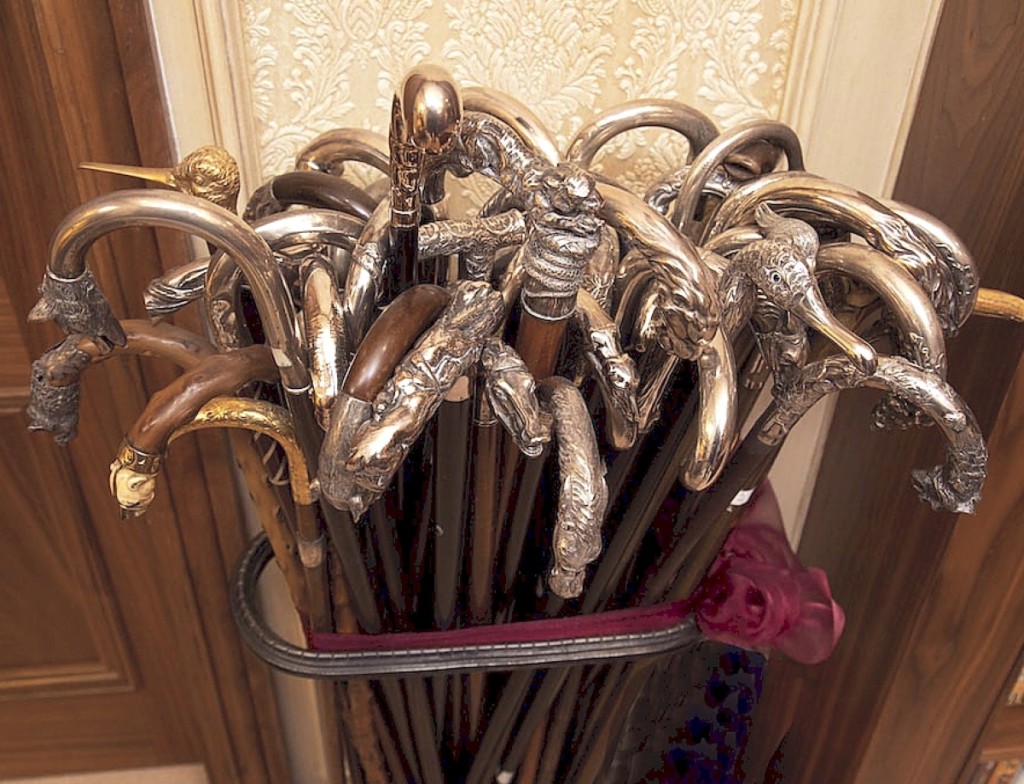 A selection of silver handled canes.