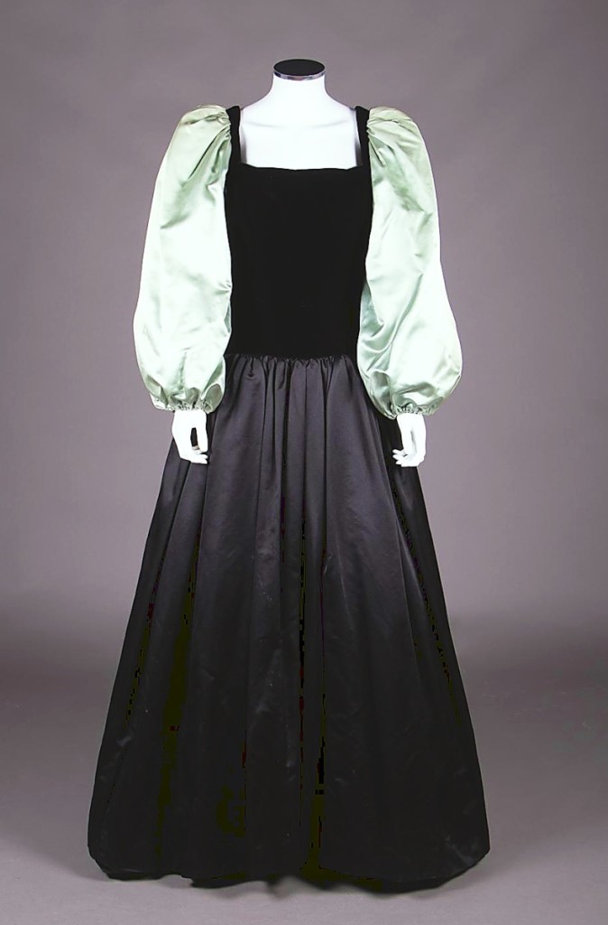 One of Yves Saint Laurent’s most significant collections was his Ballets Russes Collection from 1976. This couture gown from that collection featured a black silk velvet torso with celadon silk peau de soie balloon sleeves, a full black peau de soie skirt and an underskirt of seafoam silk taffeta. It had been featured in four exhibitions at the Fashion Institute of Technology and rose to $3,375 from a private collector ($500/800).