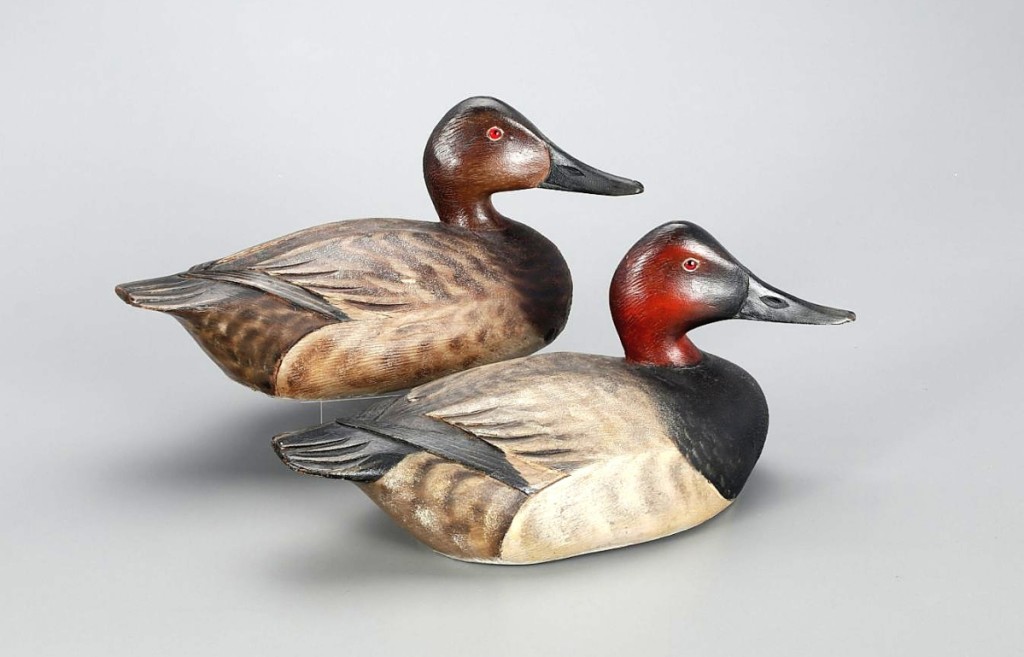 The prized lot of the wide selection of Elmer Crowell carvings was a circa 1920 pair of working canvasbacks decoys. The raised wings and turned heads show Crowell intended these to be special. Collectors agreed and the pair earned $102,000.