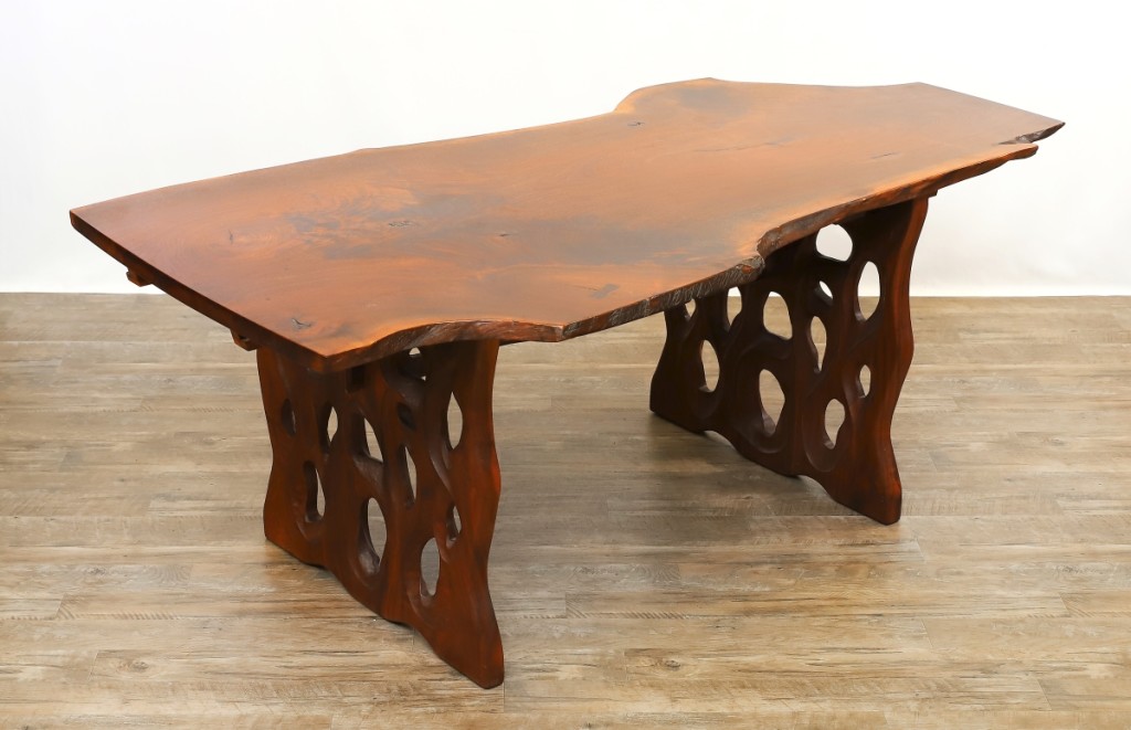 Among the Twentieth Century Nakashima-style furniture pieces on offer, this Gino Russo live edge walnut dining table, signed and dated 1972, jumped its $1,5/2,500 estimate to finish at $20,400.
