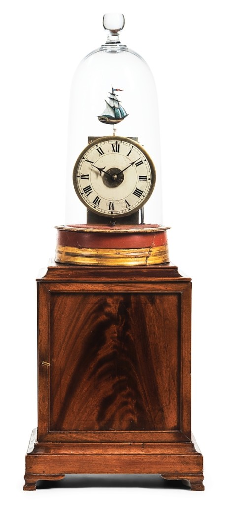 This Simon Willard Lighthouse alarm clock featuring a painted iron rocking ship, circa 1818, took $31,250 against a $7/9,000 estimate.