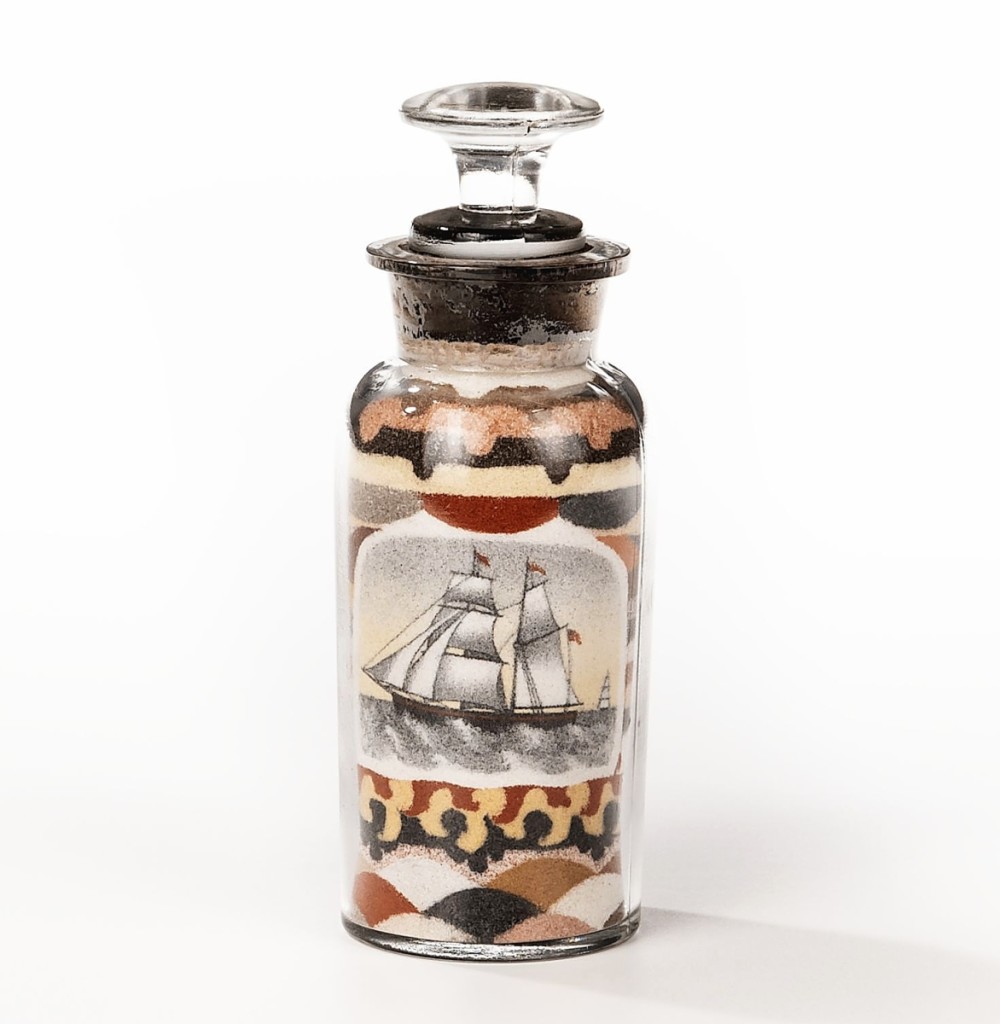 The sale included two sand bottles made by Andrew Clemens, McGregor, Iowa, late in the Nineteenth Century. Bringing $37,500, this one depicted an unnamed sailing ship on one side with an American flag and eagle on the reverse. The second Clemens bottle did not sell.
