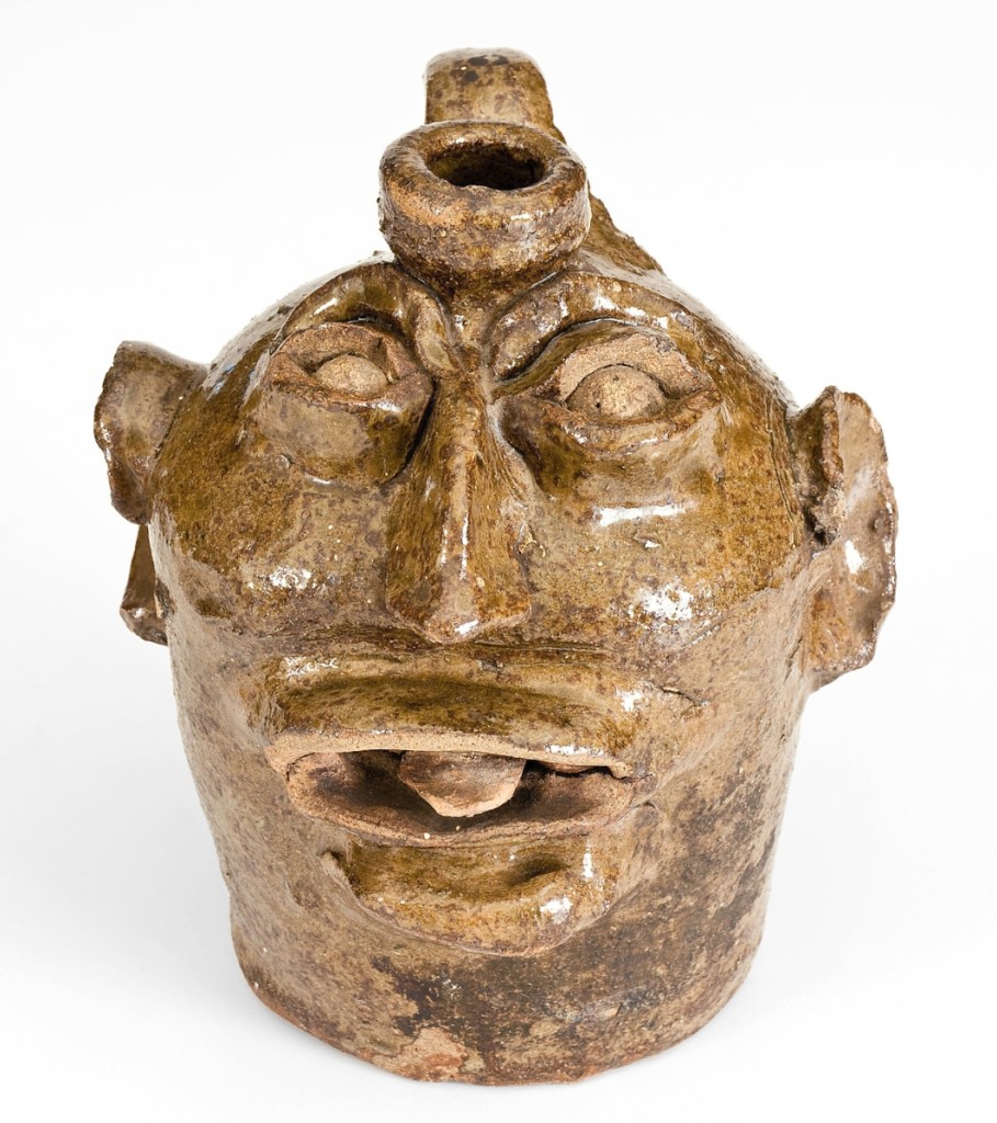 The protruding tongue on this stoneware face jug is an unusual feature of pots made at Lewis Miles’ Stony Bluff Manufactory in the Edgefield District, S.C. It finished at $60,000 and sold to a Southern institution ($30/50,000).