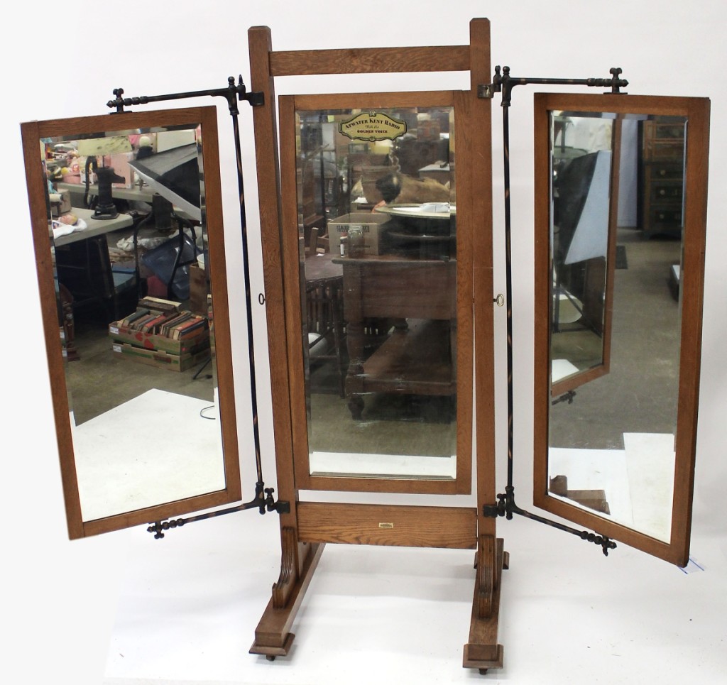 Fetching $2,300 was an oak Arts and Crafts dressing mirror.