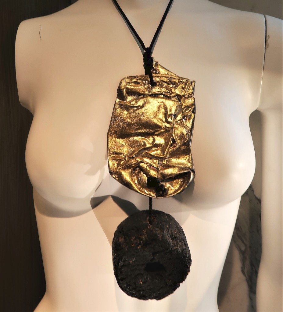 Didier Ltd. of London embraced the department-store concept, showing jewelry such as this necklace by sculptor Louise Nevelson on bare mannequins.