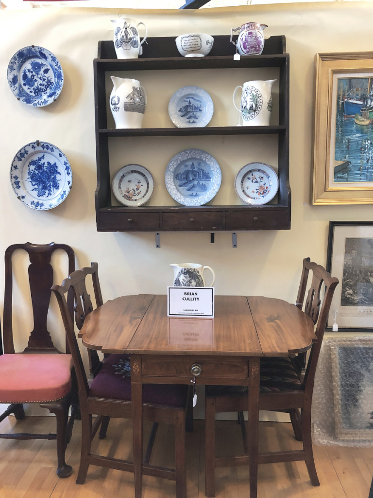 Brian Cullity, Sagamore, Mass., identified the Federal period inlaid dropleaf table as having originated either in Baltimore or the New York area. The price was $2,200. His booth included Liverpool jugs and delft. The two circa 1755-65 bianco-sopra-bianco plates were being sold as a pair, since the design of each was identical, although one was larger than the other.