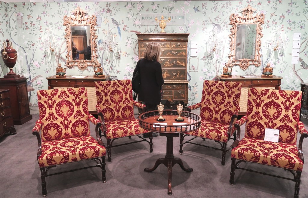 A set of four George III mahogany library armchairs, English, circa 1760. Ronald Phillips Ltd., London.