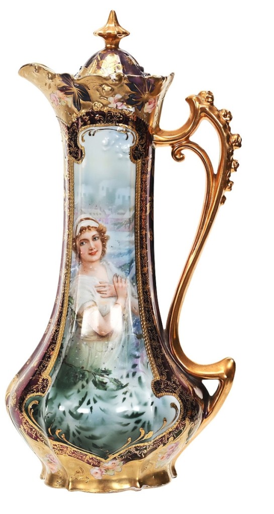Chocolate pot marked R.S. Prussia in the Rosebud mold, 11¾ inches tall, with a keyhole winter scene portrait décor, iridescent Tiffany background and extensive gold stencil highlights, left the gallery at $3,025.