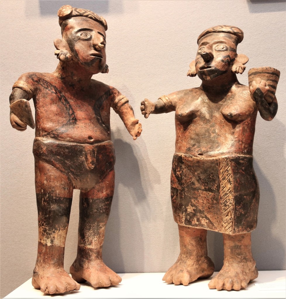 Pair of Nayarit standing figures of a man and a woman, 200 BCE-300 CE, polychromed earthenware. Throckmorton Fine Art, New York City.