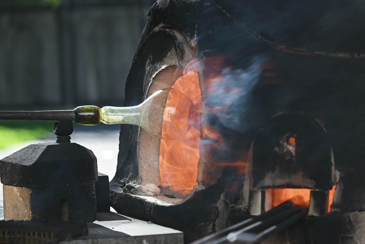 12_Glassblowing demonstration using a reproduction of an ancient wood-fired glass furnace built by CMoG_Dig Deeper