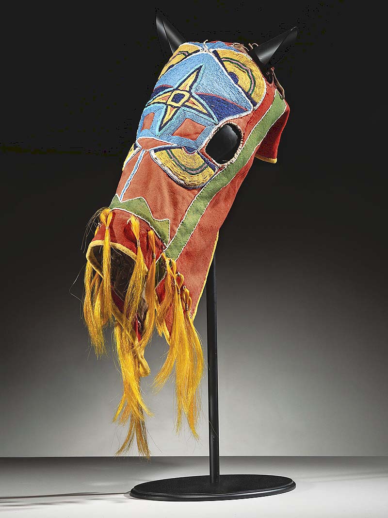 With vibrant dyed and beaded colors, this late Nineteenth Centur